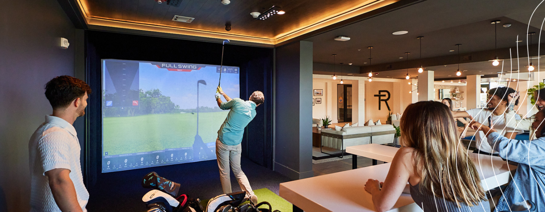 People playing on golf simulator