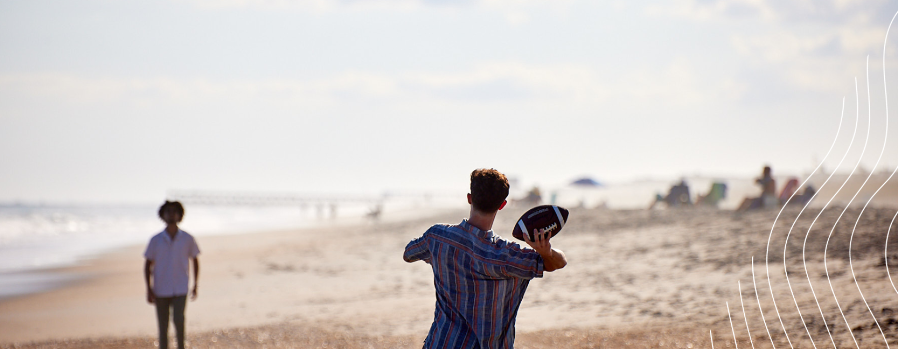 People playing football at wrightsville beach